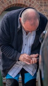 an image of locksmith unlocking car door.