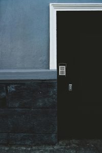 distanced photo captured of locked commercial door